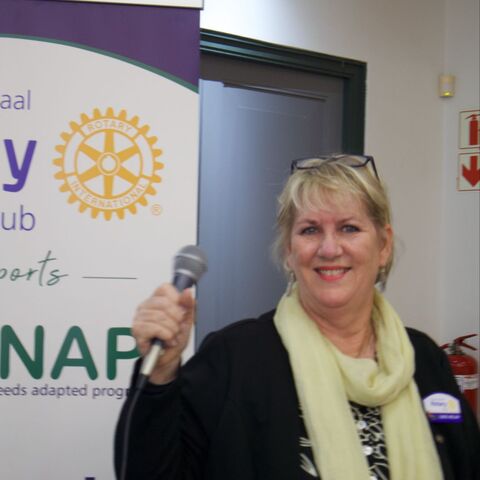 Carol Welcoming Guests